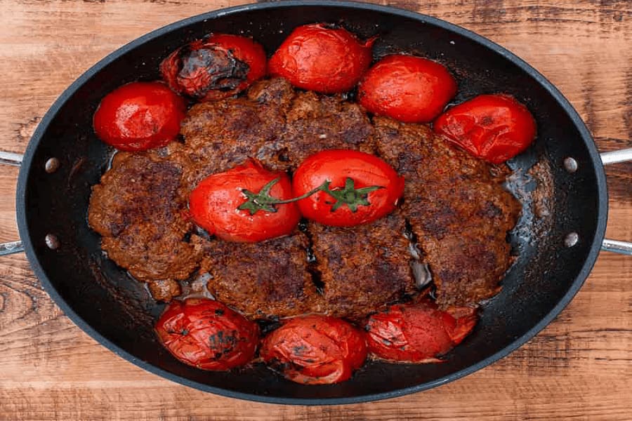 افزودن سماق، زعفران و گوجه فرنگی به کباب دیگی